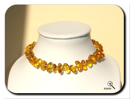 Collier d'ambre bebe eclats polis miel