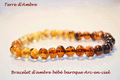 Bracelet ambre bébé baroque arc-en-ciel sur fond blanc | Terre d'Ambre